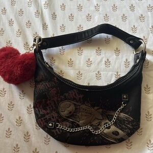 Chic Black Shoulder Bag with Red Heart Accent